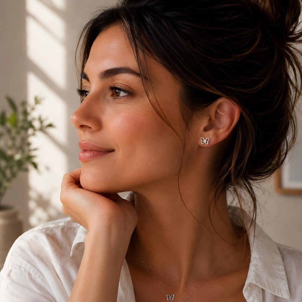 Hollow Butterfly F136 Titanium Stud Earrings